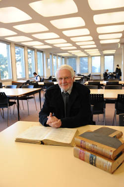 Associate Professor Max Liddell in the Law Library at Monash Clayton